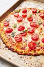 <p>For when you're craving <a href="https://www.delish.com/cooking/recipe-ideas/g269/homemade-pizza-recipes/" rel="nofollow noopener" target="_blank" data-ylk="slk:pizza;elm:context_link;itc:0;sec:content-canvas" class="link ">pizza</a> this Passover, use <a href="https://www.delish.com/cooking/recipe-ideas/g2861/cauliflower-recipes/" rel="nofollow noopener" target="_blank" data-ylk="slk:cauliflower;elm:context_link;itc:0;sec:content-canvas" class="link ">cauliflower</a> instead of wheat for the crust! Top with your fave veggies (just avoid meat if you're keeping kosher).</p><p>Get the <a href="https://www.delish.com/cooking/recipe-ideas/recipes/a47565/cauliflower-crust-pizza-recipe/" rel="nofollow noopener" target="_blank" data-ylk="slk:Cauliflower Pizza Crust recipe;elm:context_link;itc:0;sec:content-canvas" class="link "><strong>Cauliflower Pizza Crust recipe</strong></a>. </p>