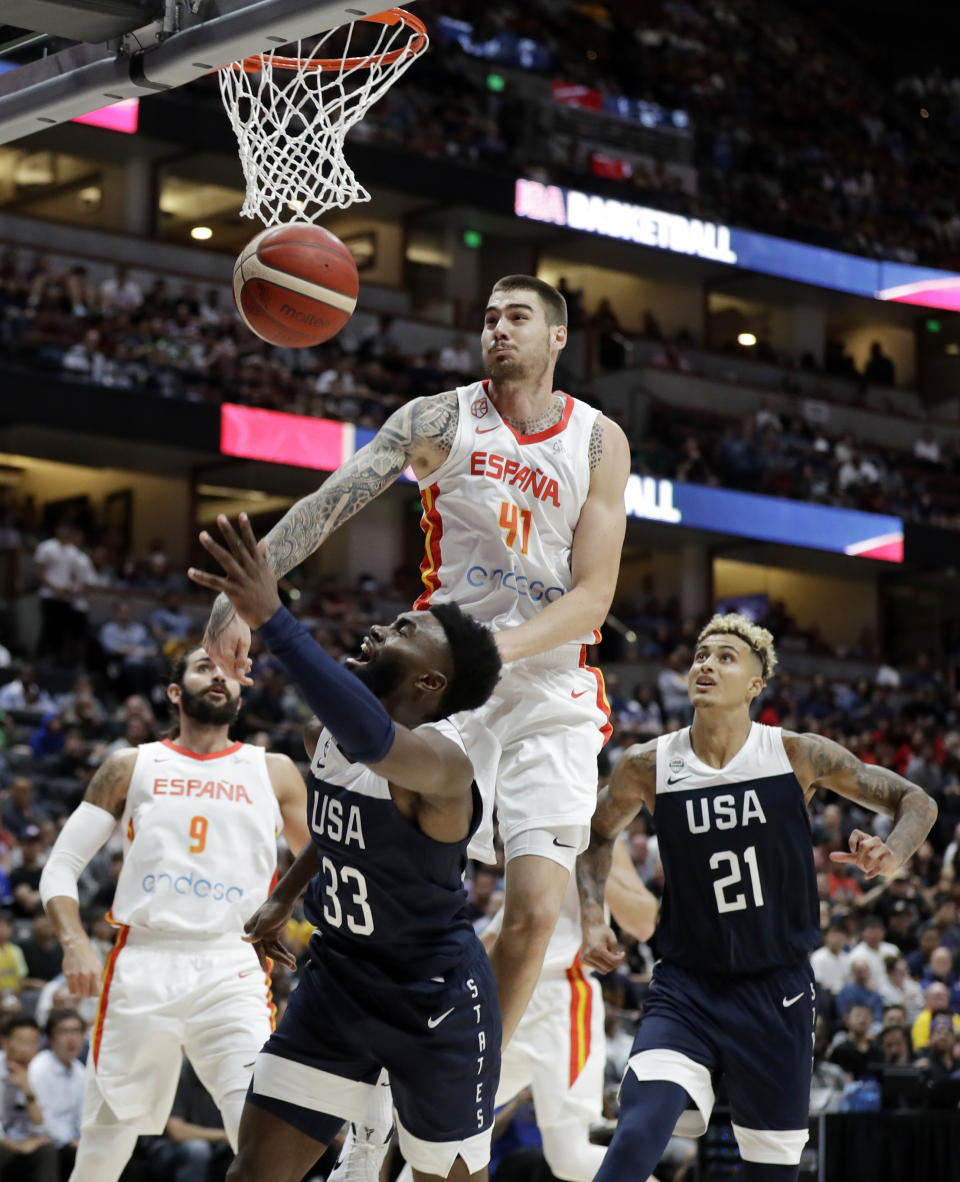 Spain's Juan Hernangomez, top center, blocks a shot from United States' Jaylen Brown during the second half of an exhibition basketball game Friday, Aug. 16, 2019, in Anaheim, Calif. (AP Photo/Marcio Jose Sanchez)