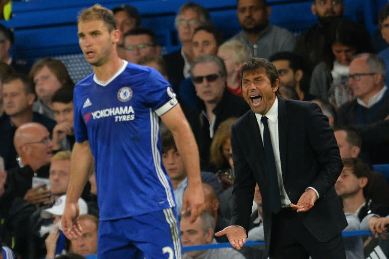 Chelsea coach Antonio Conte (right) on the touchline during his side's Premier League match against Liverpool on September 16, 2016