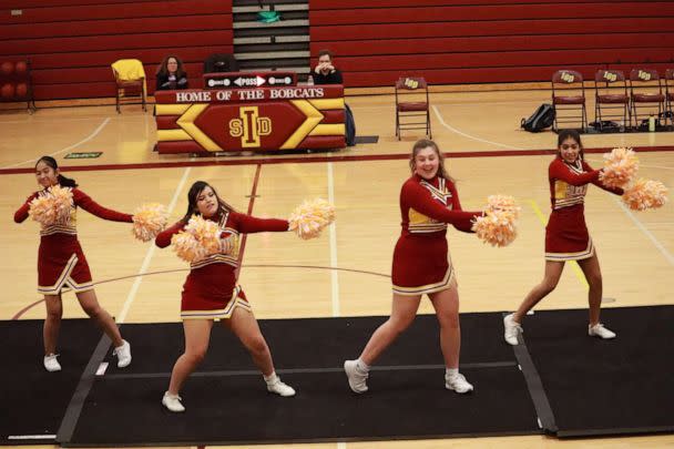 PHOTO: (From left to right) Rifenta Kisichy, Brittany Adame, Kalista Nipper and Ashley Vera-Nieto are the four current members of the Iowa School for the Deaf cheer squad. (Iowa School for the Deaf)