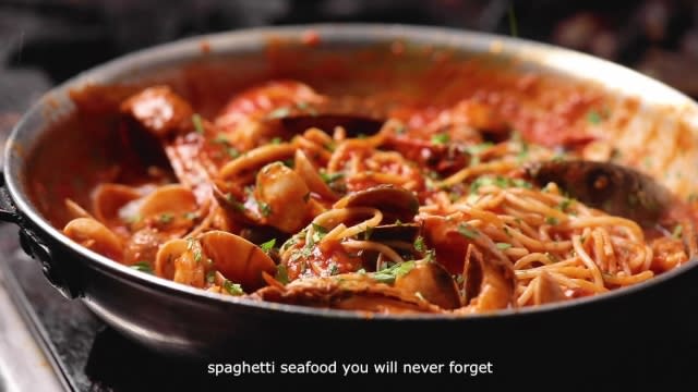 seasoning the seafood pasta