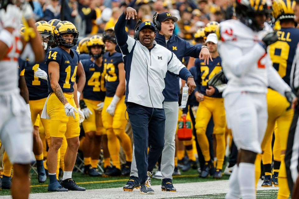 Michigan wide receivers coach Ron Bellamy reacts to a play against Maryland during the first half at the Michigan Stadium in Ann Arbor on Saturday, Sept. 24, 2022.