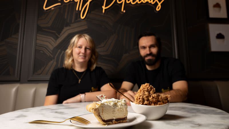 Misty Shawcroft, left, and Marc Favreau pose for a picture at The Dessert Collective in American Fork on Tuesday, Jan. 2, 2024. Along with Rachel Knight, not pictured, the three co-own the company.