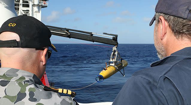 Australian search teams deploy an underwater search vehicle in 2014. Source: Getty Images