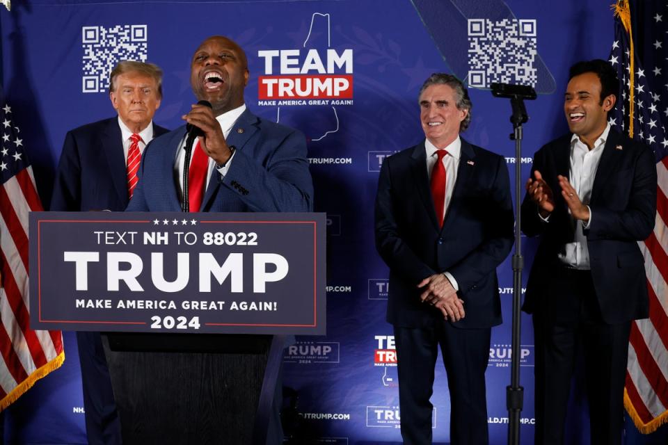 Tim Scott, Doug Burgum, and Vivek Ramaswamy attend an event for Donald Trump ahead of the New Hampshire primary in January 2024 (Getty Images)