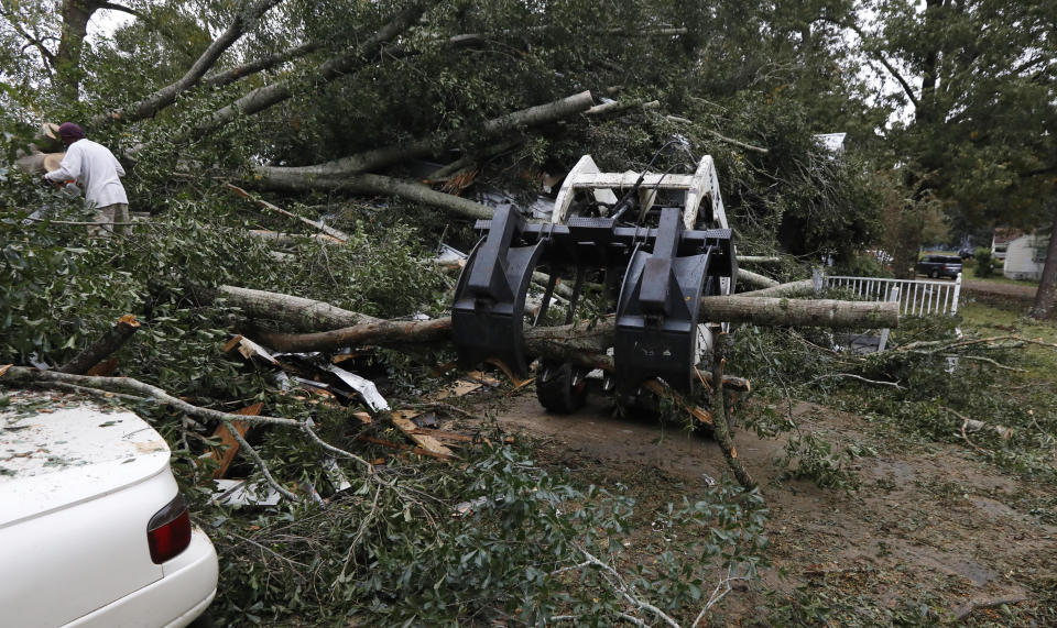 Storm system in Deep South leaves damage and death in its wake