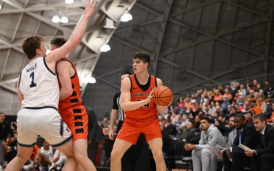 Princeton's Zach Martini handles the ball against Yale at Jadwin Gym