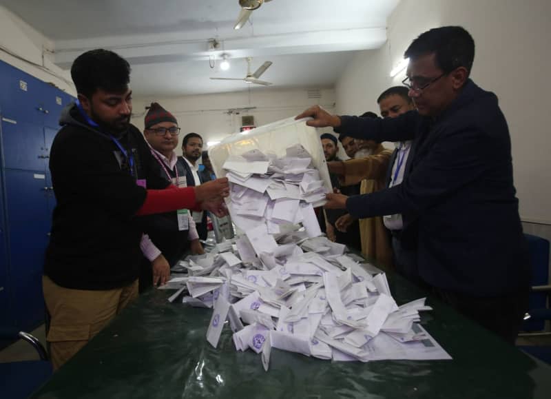Election officials count ballots after polls closed during the 12th national general election in Bangladesh. Prime Minister Sheikh Hasina is guaranteed to serve a fifth term in office following a boycott led by an opposition party she branded a "terrorist organisation." Habibur Rahman/ZUMA Press Wire/dpa