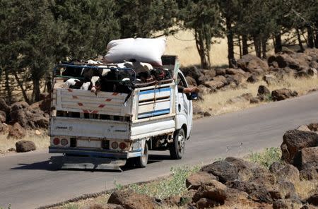 A truck loaded with cattle rides on a street in Deraa countryside, Syria June 22, 2018. REUTERS/Alaa al-Faqir