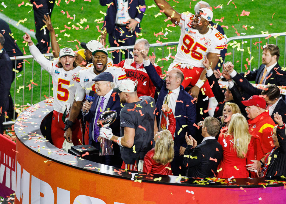 Kansas City Chiefs tight end Travis Kelce (87) speaks to Terry Bradshaw after Super Bowl LVII between the Philadelphia Eagles and the Kansas City Chiefs