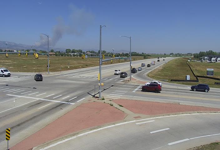 Smoke from a reported wildfire along Highway 34 in Larimer County, seen from US Highway 287 and Colorado 56 on July 29, 2024.