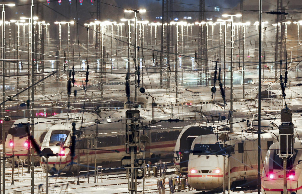 Deutsche Bahn ICE trains are parked on the tracks at the DB Fernverkehr plant in Hamburg, Germany Wednesday, Jan. 10, 2024. A union representing many of Germany’s train drivers started a nearly three-day strike early Wednesday in a rancorous dispute with the country’s state-owned main railway operator over working hours and pay. (Christian Charisius/dpa via AP)