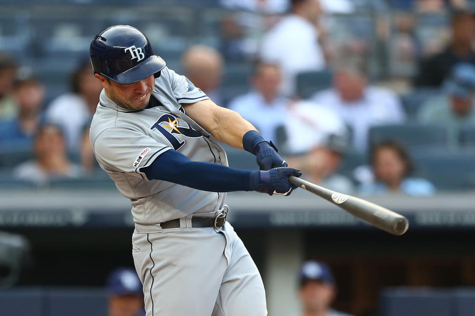 NEW YORK, NEW YORK - JULY 15:  Travis d'Arnaud #37 of the Tampa Bay Rays hits a lead-off home run in the first inning against the New York Yankees at Yankee Stadium on July 15, 2019 in New York City. (Photo by Mike Stobe/Getty Images)