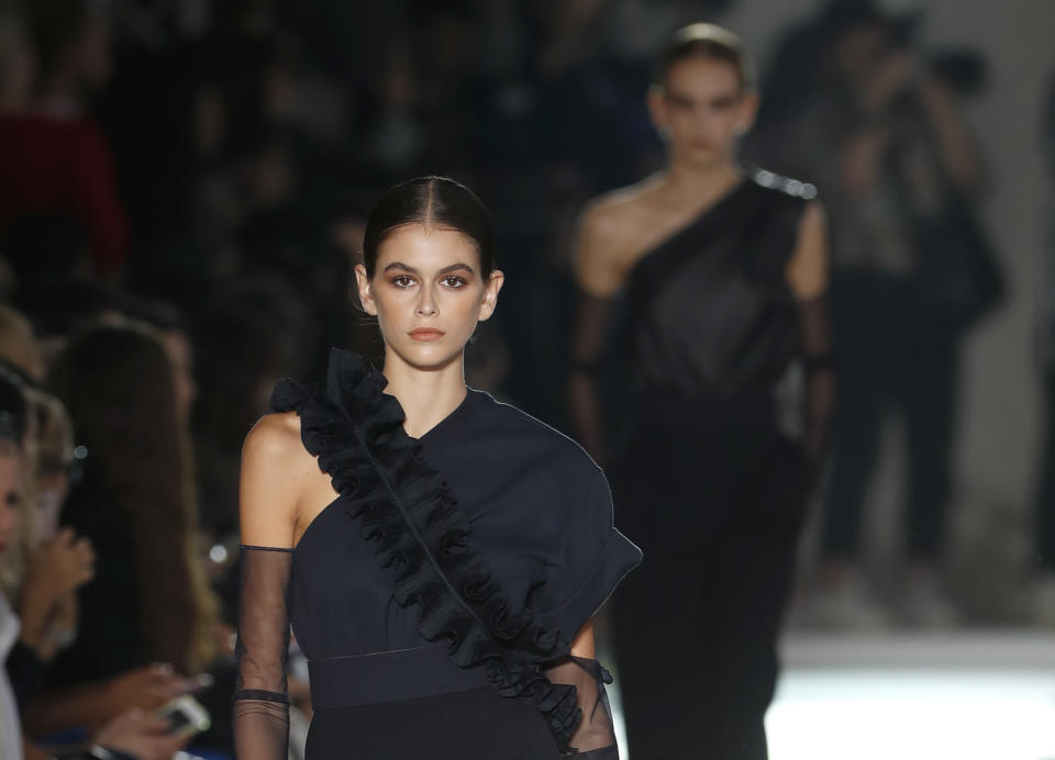 Model Kaia Gerber wears a creation as part of the Max Mara women's 2019 Spring-Summer collection, unveiled during the Fashion Week in Milan, Italy, Thursday, Sept. 20, 2018. (AP Photo/Antonio Calanni)