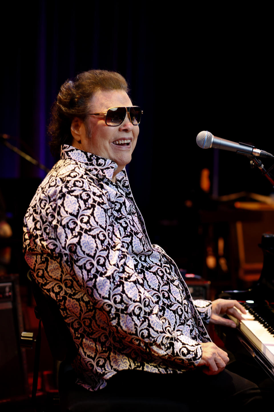 In this Jan. 16, 2019 photo, Ronnie Milsap poses for a photo on the stage of The Ryman Auditorium in Nashville, Tenn. Milsap's new album, “Ronnie Milsap: The Duets,” comes out on Friday. (Photo by Donn Jones/Invision/AP)