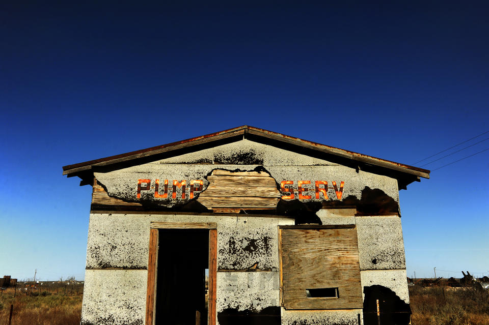 PENWELL, TX-MAR 01: A long ago shuttered shop that once serviced pump jacks in Penwell, Texas is a symbol of the boom and bust oil cycle that Texans have lived with for generations. Penwell was named after a well drilled in 1929 by independent oilman Robert R. Penn. As (per barrel) oil prices dropped these past months, many Texas drilling companies (and the local towns where they operated) suffered dramatic financial losses. Among those hit hard was the Houston based Swift Energy Company which has filed for Chapter 11 Bankruptcy protection. Terry E. Swift is the President and Chief Executive Officer of Swift Energy Company. He is now struggling to keep the company going that was founded by his father in 1979. (Photo by Michael S. Williamson/The Washington Post via Getty Images)