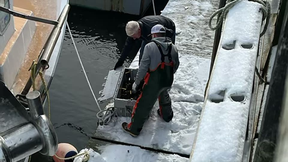 John King with fisherman Andrew Konchek in Portsmouth, New Hampshire, in January. - CNN