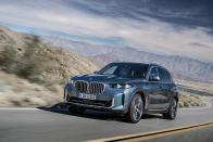 <p>BMW has dropped the curtains on its most important SUV, the X5. The company's flagship has received a new fascia with a bigger grille, along with a host of mechanical and technical upgrades. </p><p><a class="link " href="https://www.roadandtrack.com/news/a42780212/2024-bmw-x5-x6/" rel="nofollow noopener" target="_blank" data-ylk="slk:Head on over here for the full story;elm:context_link;itc:0">Head on over here for the full story</a></p>