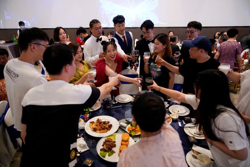 The Wider Image: Coronavirus dampens celebrations in China's wedding gown city