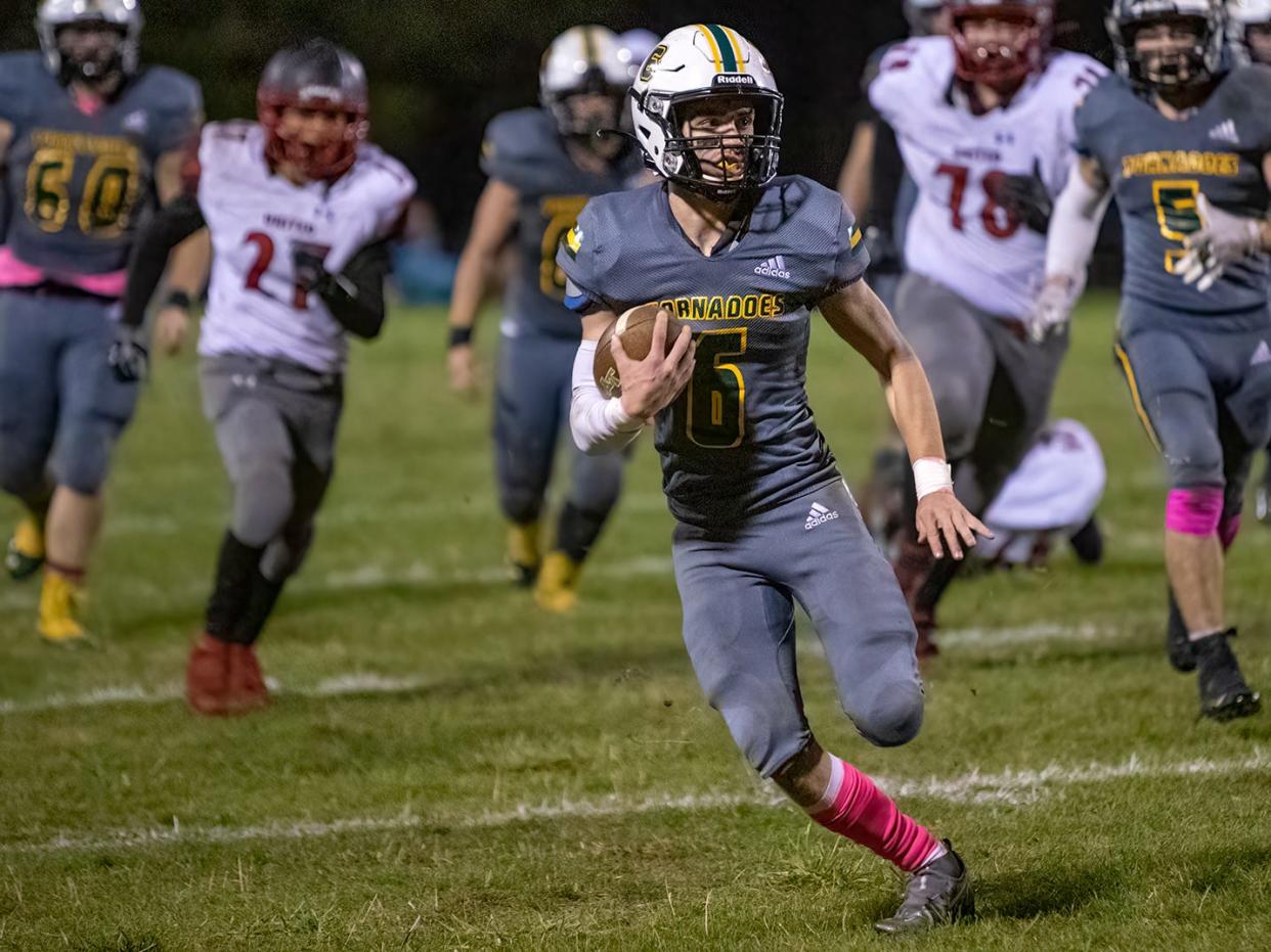 Abingdon-Avon High School senior quarterback Easten Schisler breaks away for a long run during the Tornadoes' 40-26 loss to United High School in the regular season finale on Friday, Oct. 22, 2021 at Don Viar Memorial Field.