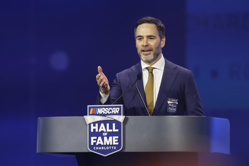Jimmie Johnson speaks during his induction into the NASCAR Hall of Fame in Charlotte, N.C., Friday, Jan. 19, 2024. (AP Photo/Nell Redmond)