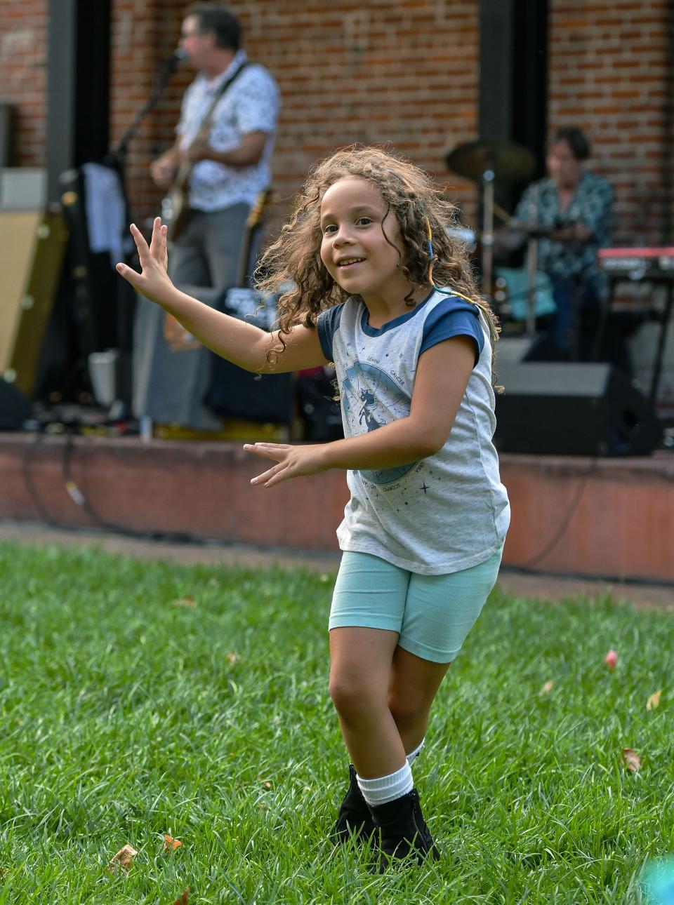 Layla Burns, 5, of Hagerstown dances to the music at the MDWK Music and Market at University Plaza in downtown Hagerstown in this file photo. The event, which features free live music, an artisan market, a beer garden, food vendors, and a kids zone is returning this summer.