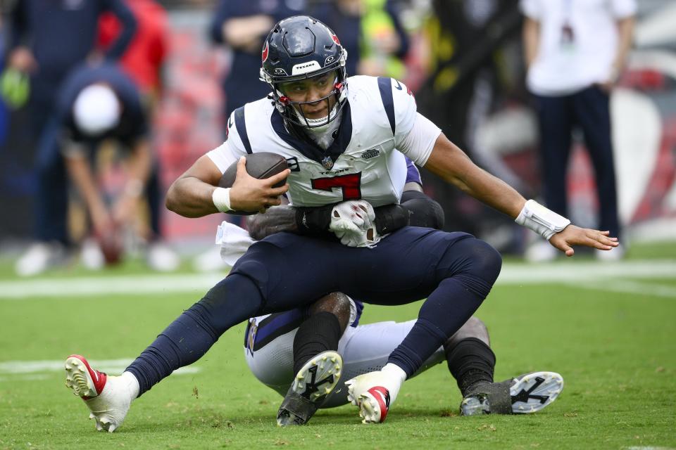 Baltimore Ravens' Roquan Smith sacks Houston Texans' C.J. Stroud during the second half of an NFL football game Sunday, Sept. 10, 2023, in Baltimore. (AP Photo/Nick Wass)