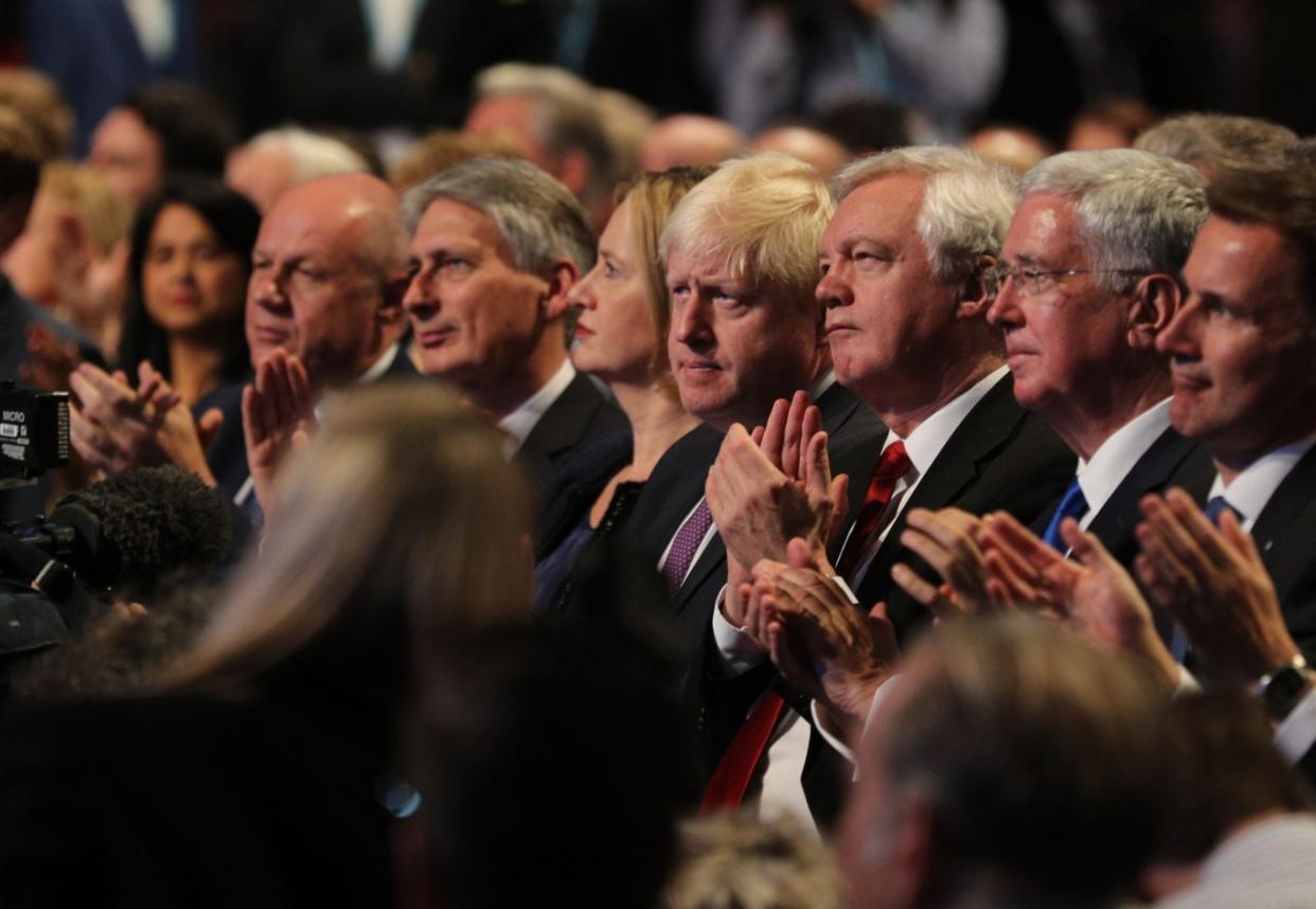 Foreign Secretary Boris Johnson and other members of the cabinet listen to Prime Minister Theresa May deliver her keynote speech at the Conservative Party Conference (Owen Humphreys/PA)
