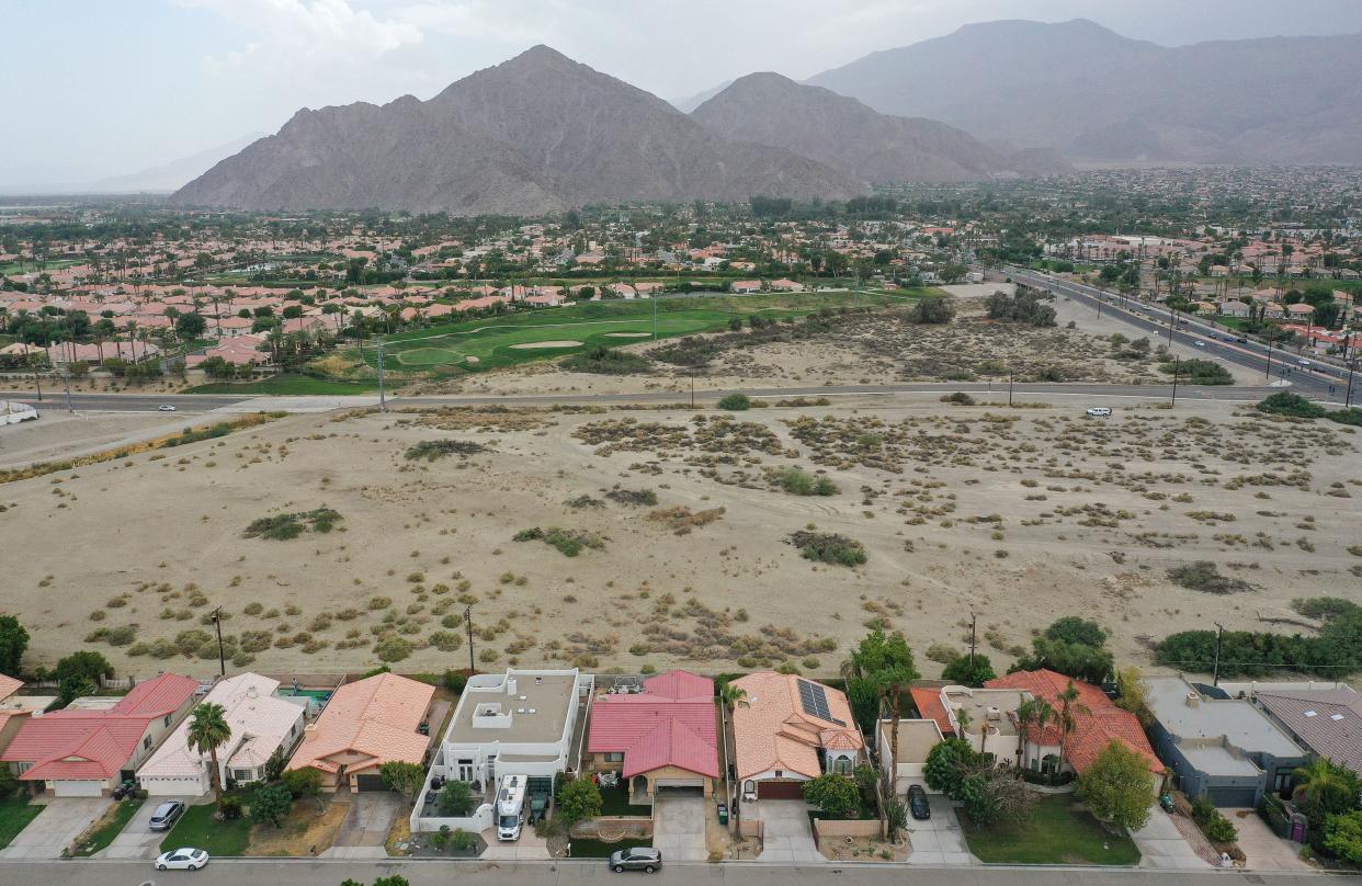 The La Quinta City Council approved a 252-unit apartment complex on this empty lot at the corner of Avenue 50 and Washington Street, seen in August 2023.