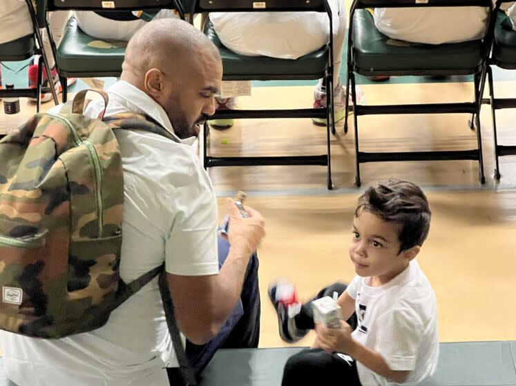 Birmingham coach Nick Halic brought his 3-year-old son to The Classic at Damien on Wednesday.