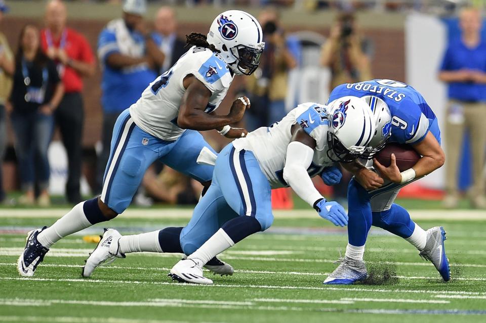 Matthew Stafford, right, took a shot here but dished one out himself (Getty Images).