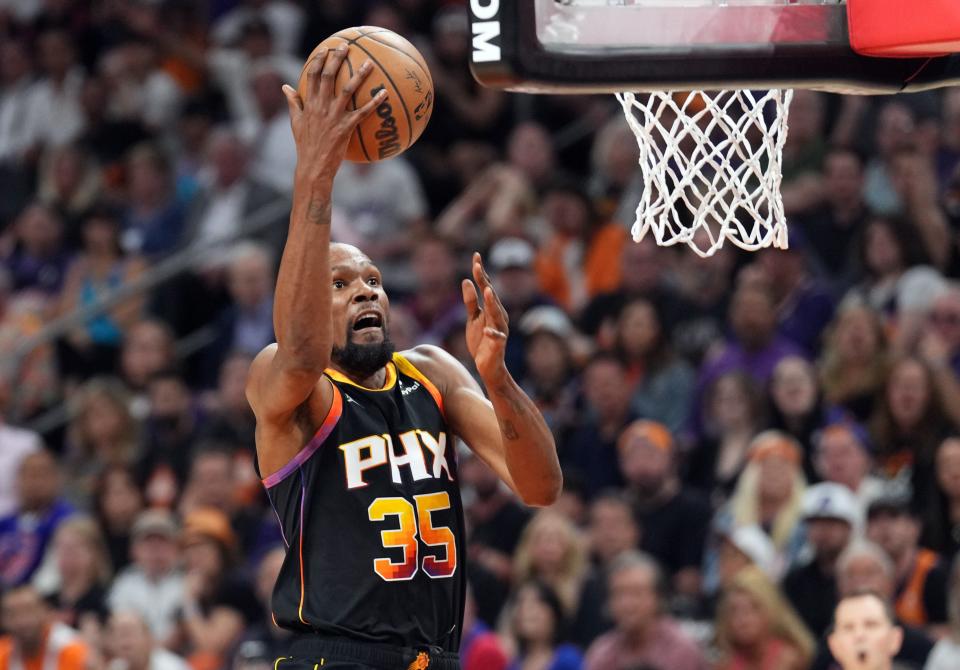 Phoenix Suns forward Kevin Durant scores on a layup during a first-round playoff game against the Los Angeles Clippers.