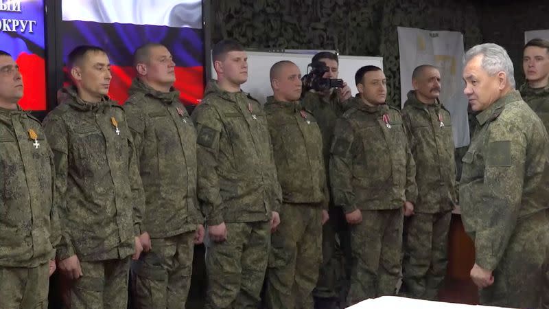 Russian defence minister pays rare visit to troops in Ukraine