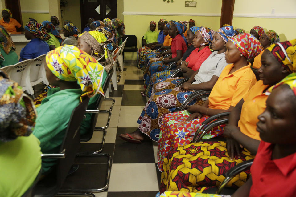 FILE - Chibok schoolgirls, freed some years ago from Nigeria extremist captivity, are seen in Abuja, Nigeria. Monday May 8, 2017. Their experience represents a worrying new development in Nigeria, Africa's most populous country where the mass abduction of Chibok schoolgirls a decade ago marked a new era of fear even as nearly 100 of the girls remain in captivity. An array of armed groups now focus on abducting schoolchildren, seeing in them a lucrative way to fund other crimes and control villages in the nation's mineral-rich but poorly-policed northwestern region. (AP Photo/Sunday Alamba, File)