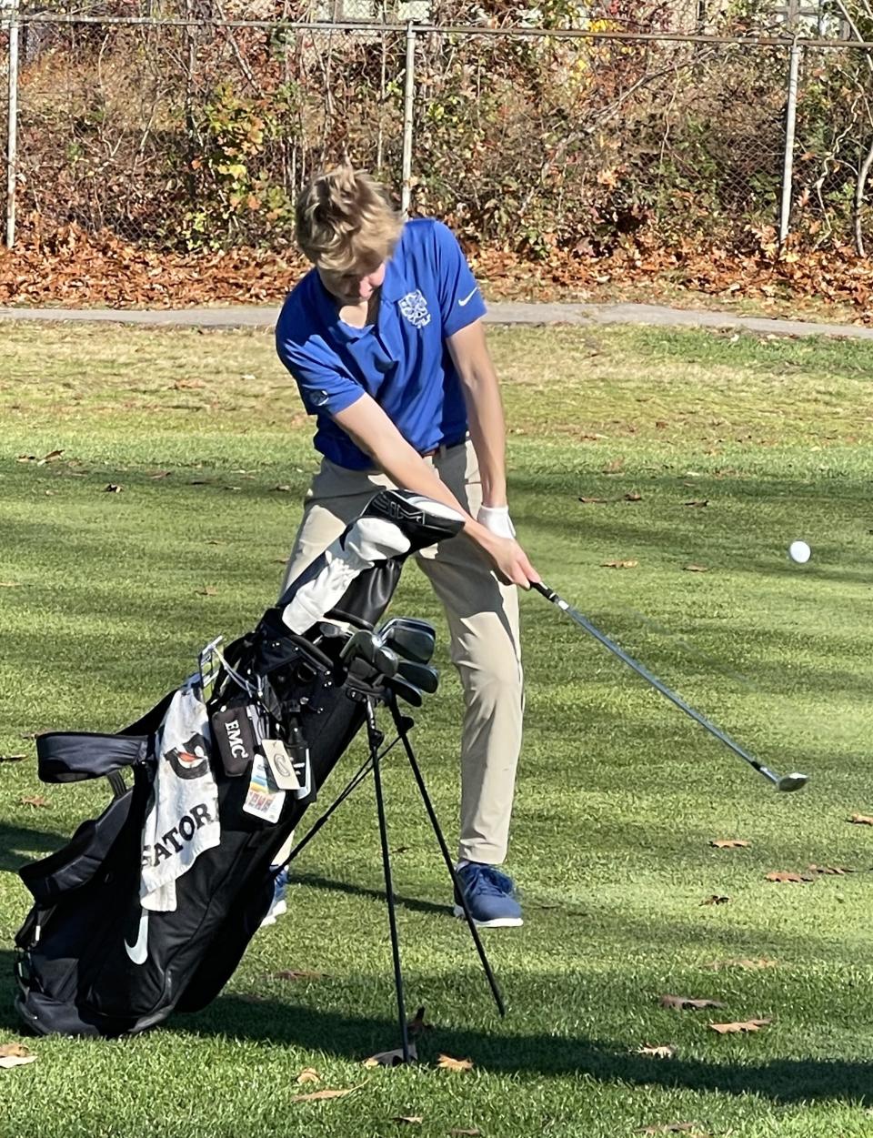 Dover-Sherborn senior Sean Scannell chips onto the 14th green at the Division 2 state championship at Thorny Lea in Brockton on Oct. 31, 2023.