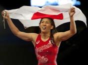 Sep 9, 2015; Las Vegas, NV, USA; Saori Yoshida of Japan displays her nation's colors while celebrating a victory in a medal round on the third night of the World Wrestling Championships at The Orleans Arena. Mandatory Credit: Stephen R. Sylvanie-USA TODAY Sports
