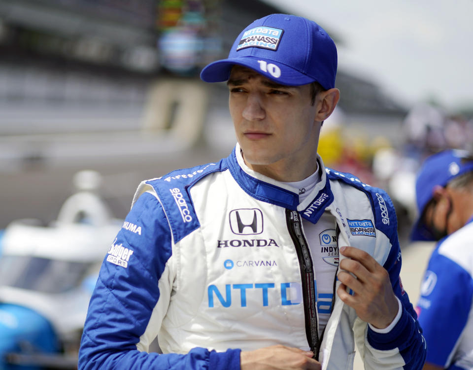 FILE - Alex Palou, of Spain, waits to drive during practice for the Indianapolis 500 auto race at Indianapolis Motor Speedway in Indianapolis, May 20, 2021. The IndyCar season begins Sunday, March 5, 2023, with the Grand Prix of St. Petersburg. (AP Photo/Darron Cummings, File)