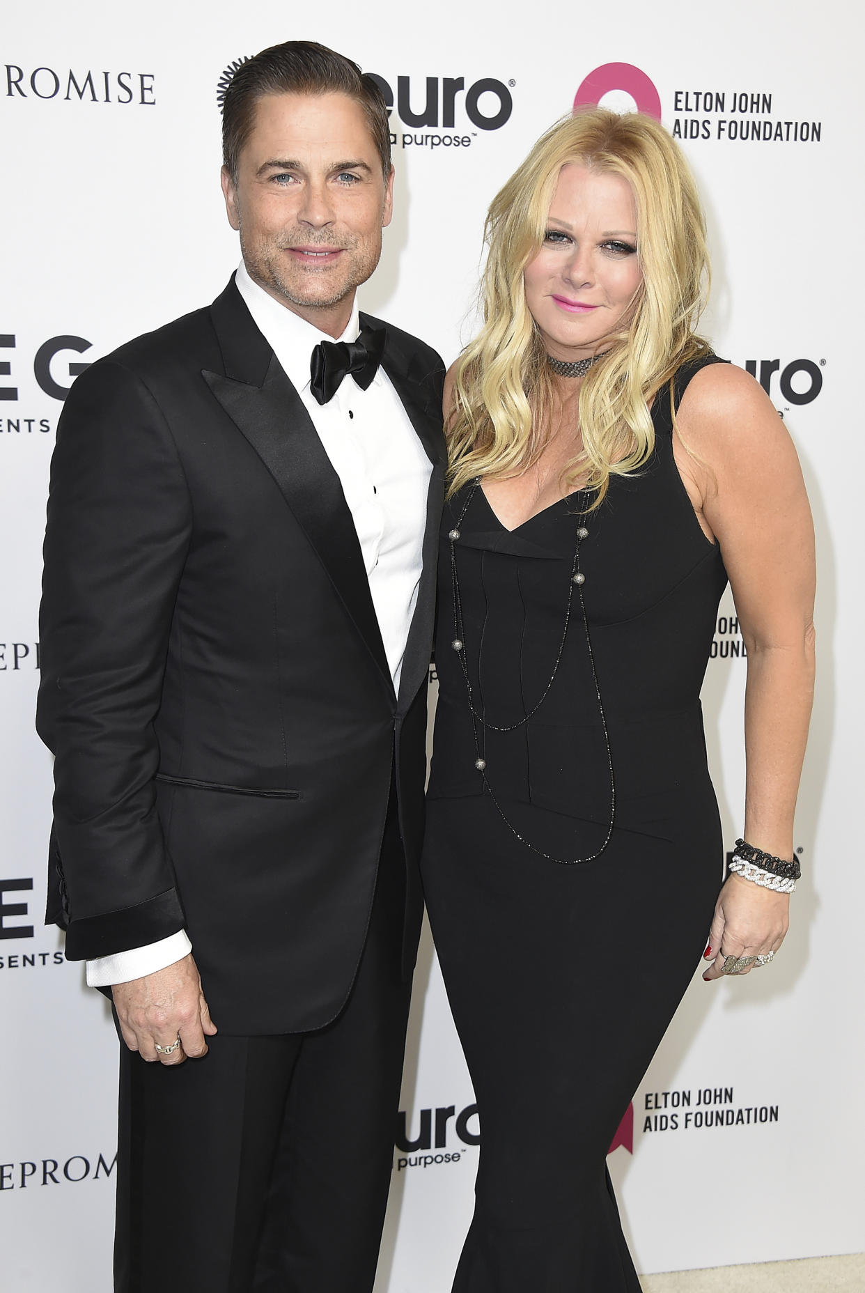 Rob Lowe and Sheryl Berkoff arrive at Elton John's 70th Birthday and 50-Year Songwriting Partnership with Bernie Taupin on Saturday, Mar. 25, 2017 in Los Angeles. (Photo by Jordan Strauss/Invision/AP)