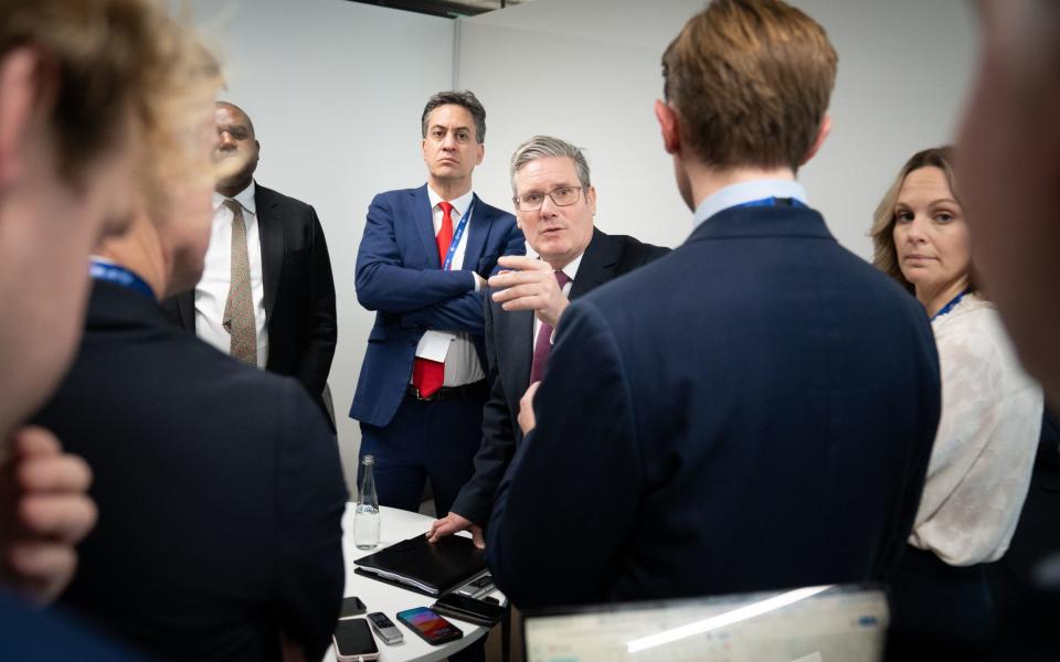 Labour leader Sir Keir Starmer (right) and Shadow Secretary of State for Climate Change and Net Zero, Ed Miliband hold a briefing with the media during the Cop28 UN climate summit in Dubai