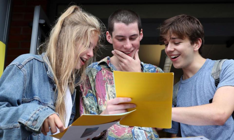 Madeline Ashman, Thomas Wroy and William Sharp after getting A-level results at Peter Symonds College in Winchester, Hampshire.