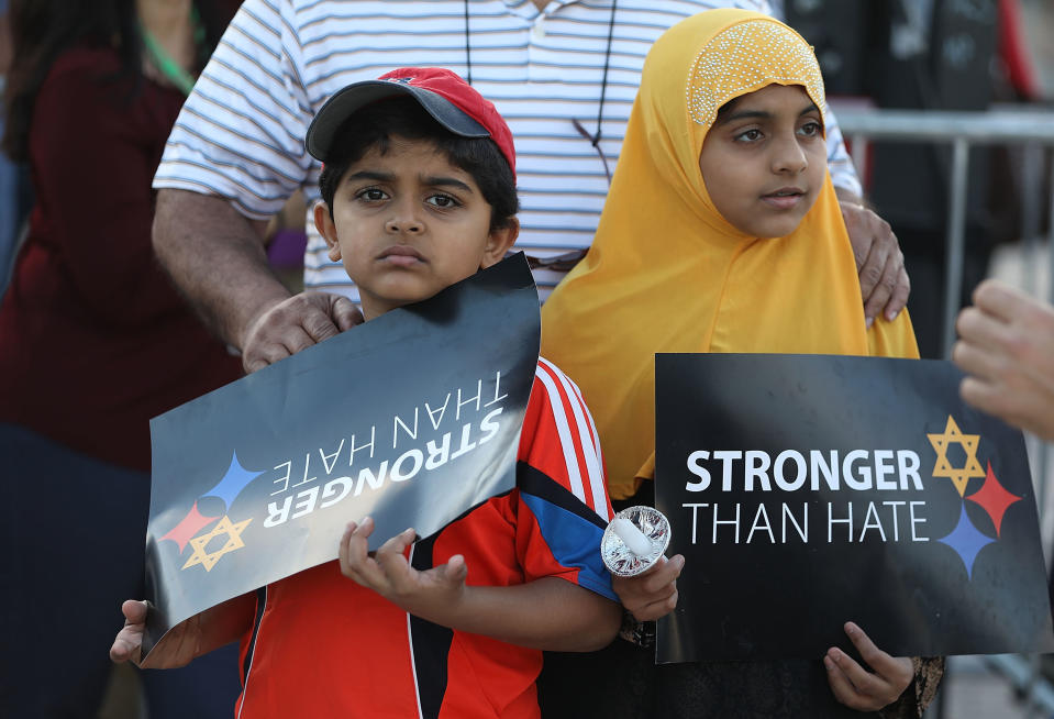 Children participate in a vigil in Miami on Oct. 30, 2018, in honor of the victims of a mass shooting at Pittsburgh's Tree of Life synagogue. (Joe Raedle via Getty Images)