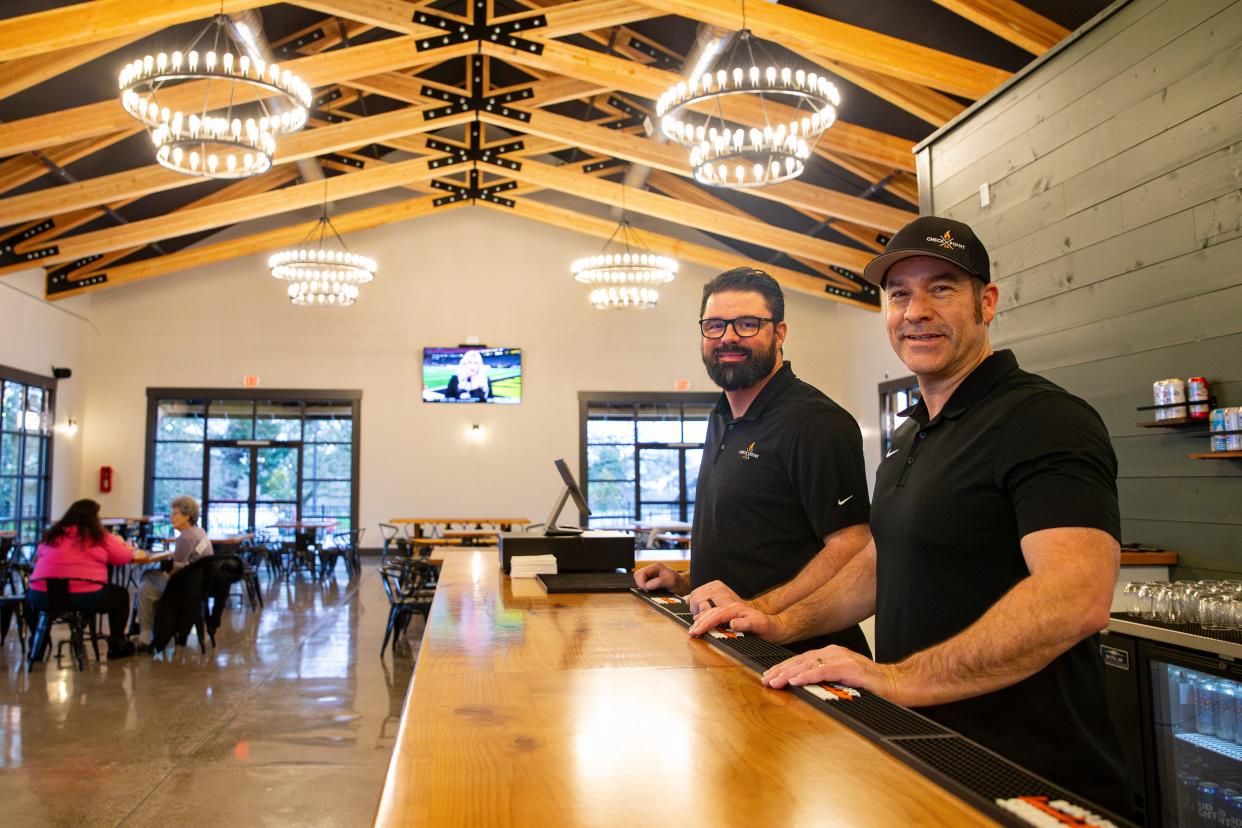 Roy Long, left, and Scott Martin are the co-owners of the Checkpoint 221 food pod and pavilion in West Salem.