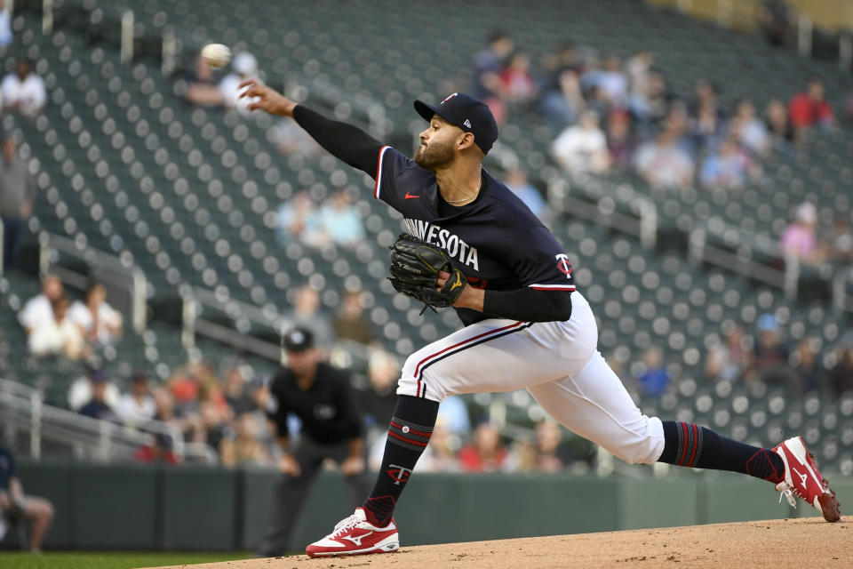 Minnesota Twins pitcher Pablo Lopez throws to a Chicago White Sox batter during the first inning of a baseball game Tuesday, April 11, 2023, in Minneapolis. (AP Photo/Craig Lassig)