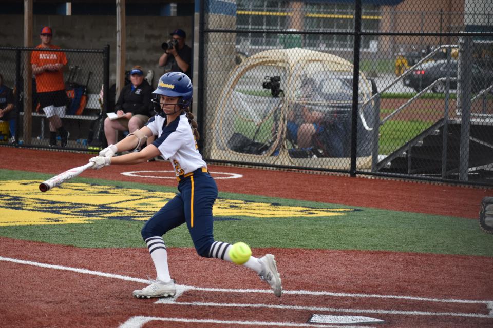Mooresville's Madison Poulson hits a foul ball during the Pioneers' sectional championship game with Whiteland on May 25, 2022.