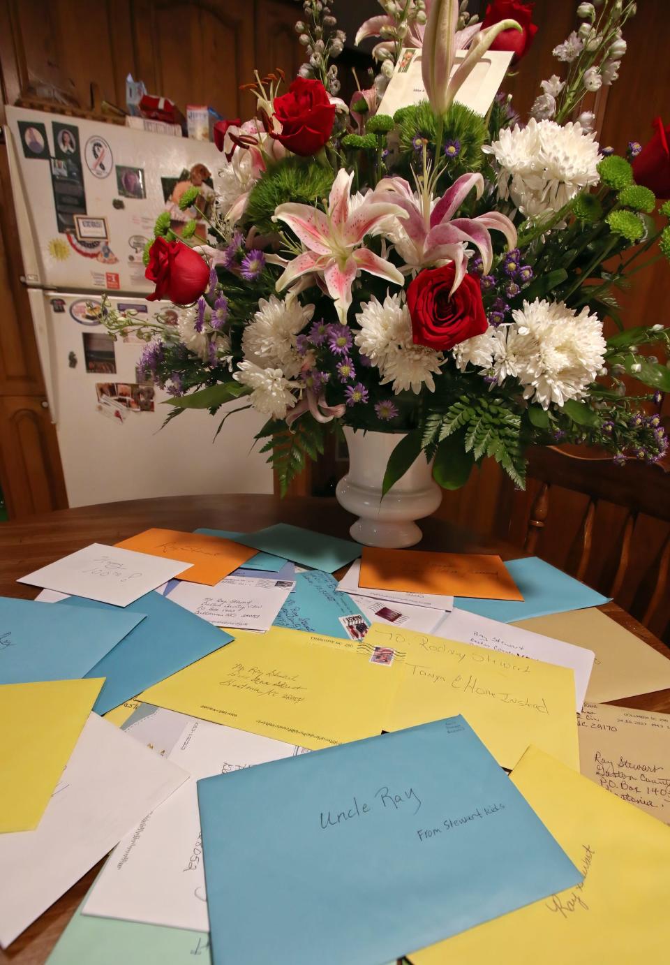 Birthday cards fill the kitchen table for 100-year-old Army veteran Ray Stewart at his home on Ann Street in Gastonia Tuesday morning, Aug. 15, 2023.