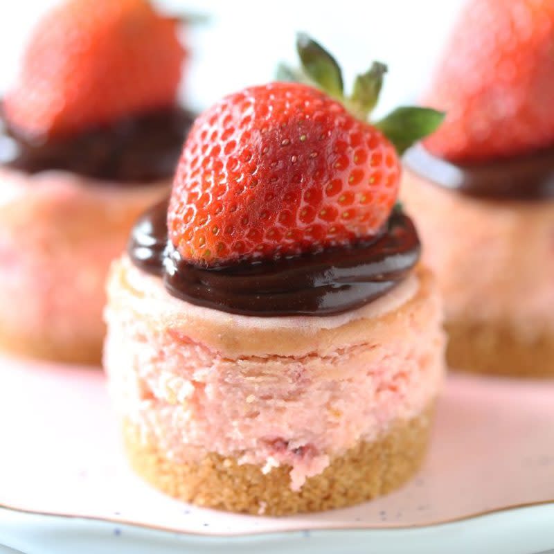 <p>Handle the Heat</p><p>These chocolate strawberry mini cheesecakes are perfectly easy, adorable, and transportable for the perfect Thanksgiving dessert.</p><p><strong>Get the recipe: <a href="https://handletheheat.com/chocolate-strawberry-mini-cheesecakes/" rel="nofollow noopener" target="_blank" data-ylk="slk:Chocolate Strawberry Mini Cheesecakes;elm:context_link;itc:0;sec:content-canvas" class="link ">Chocolate Strawberry Mini Cheesecakes</a></strong></p>