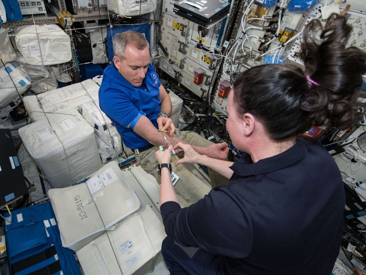 David Saint-Jacques on board the International Space Station in 2019 participating in a study on space-related changes that occur in blood and bone marrow. Before he was an astronaut, he was a doctor, and will now help judge the Deep Space Healthcare Challenge. (NASA - image credit)