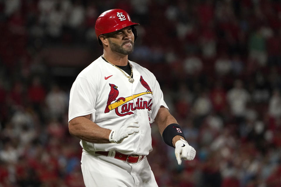 St. Louis Cardinals' Albert Pujols reacts after flying out during the third inning of a baseball game against the Milwaukee Brewers Tuesday, Sept. 13, 2022, in St. Louis. (AP Photo/Jeff Roberson)