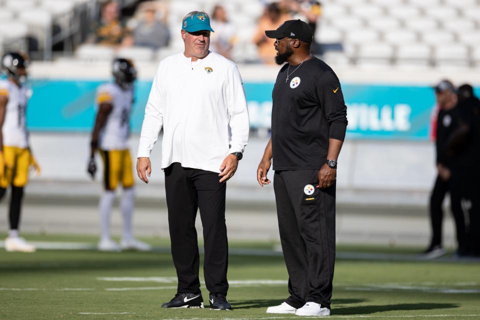 Aug 20, 2022; Jacksonville, Florida, USA; Jacksonville Jaguars head coach Doug Pederson and Pittsburgh Steelers head coach Mike Tomlin talk before the game at TIAA Bank Field. Mandatory Credit: Matt Pendleton-USA TODAY Sports