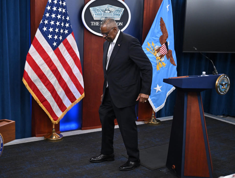 Austin leaves the podium after a news conference at the Pentagon on Thursday.